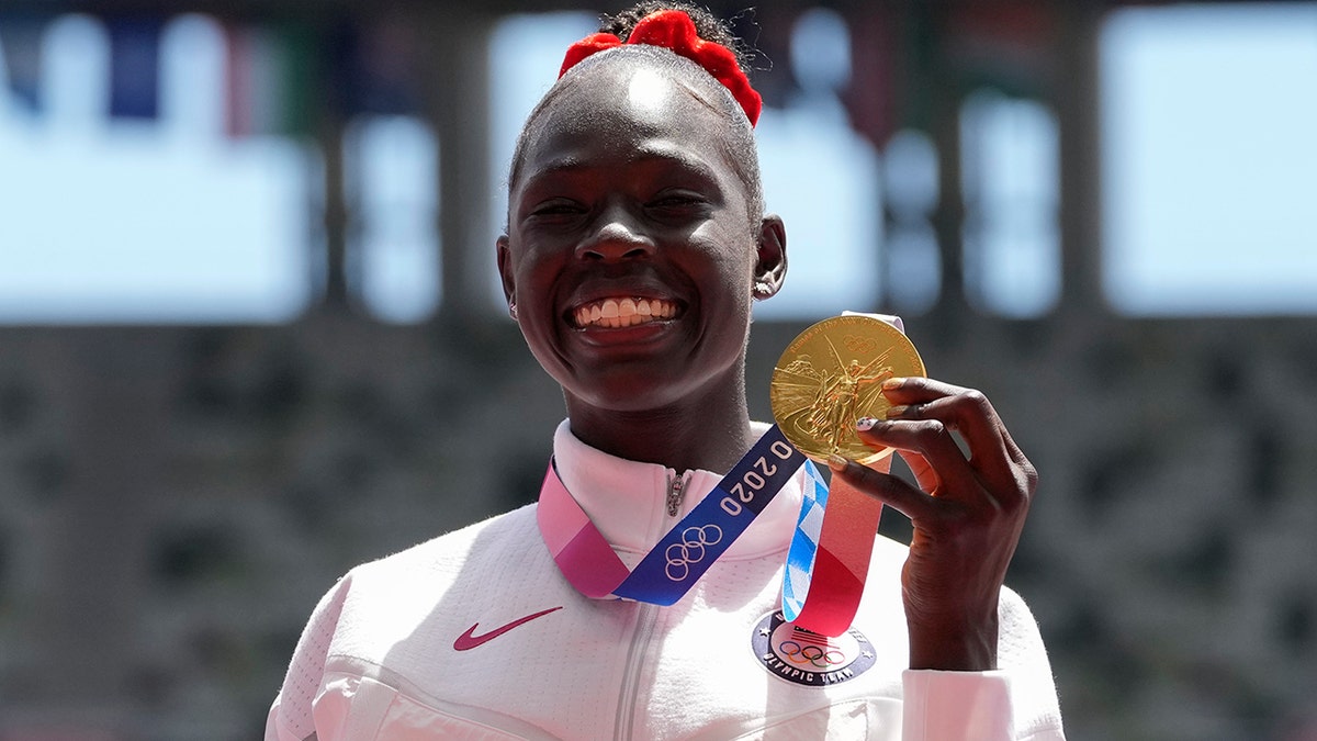 Gold medalist Athing Mu, of the United States, stands during the medal ceremony for the women's 800-meter at the 2020 Summer Olympics