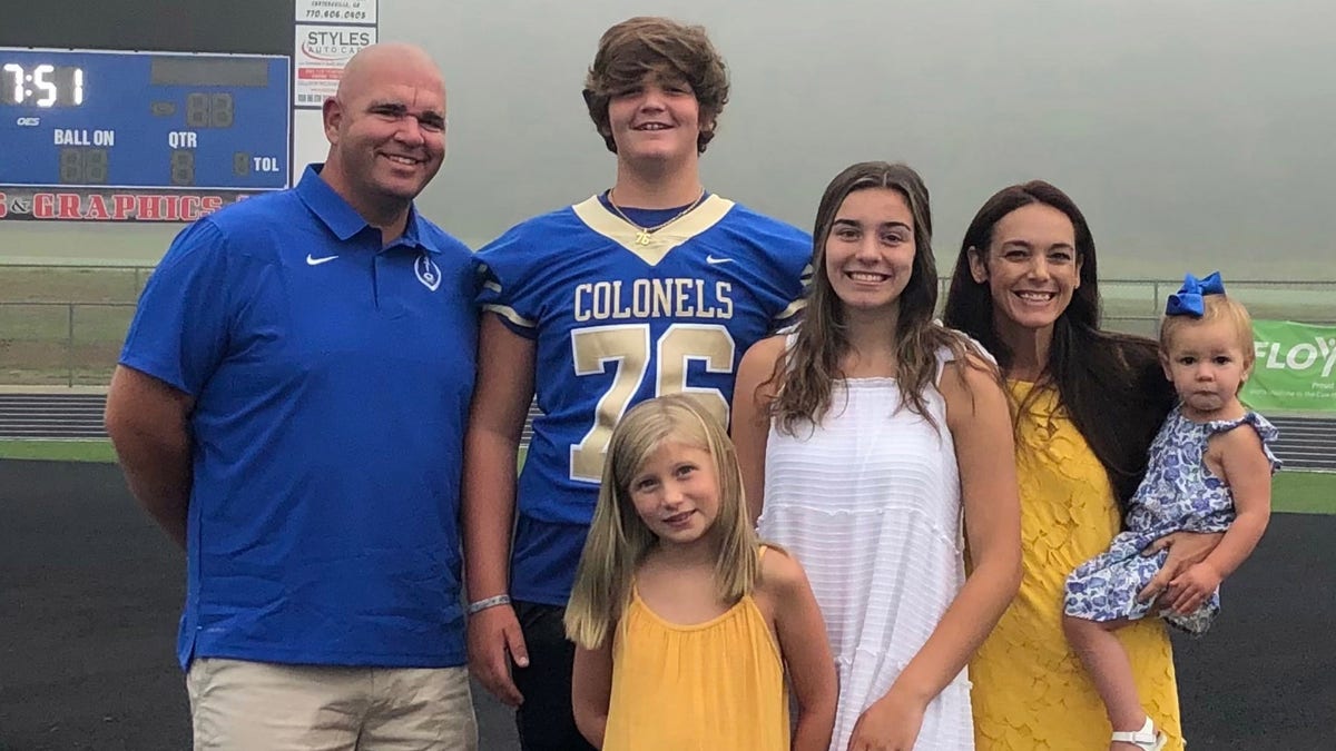 McWhorter, pictured with his family, has been a devoted tackle football player since around six.