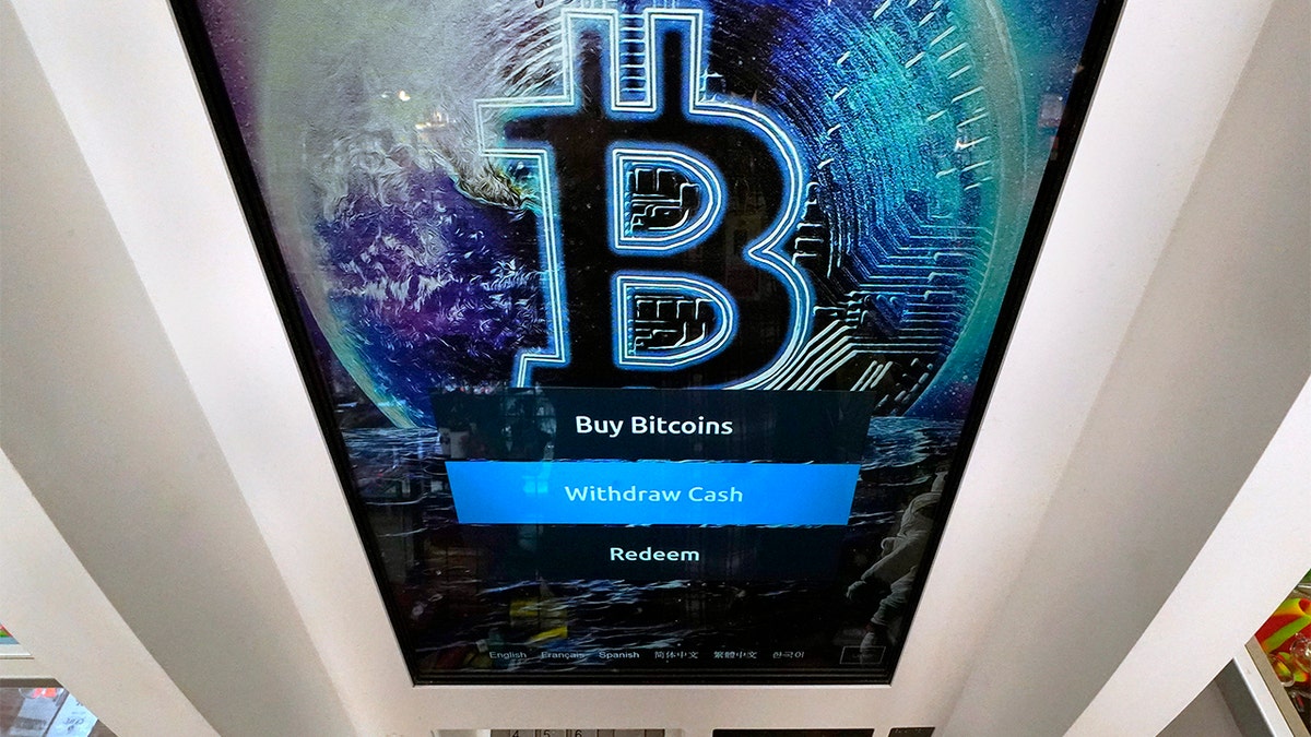 Bitcoin logo on an ATM