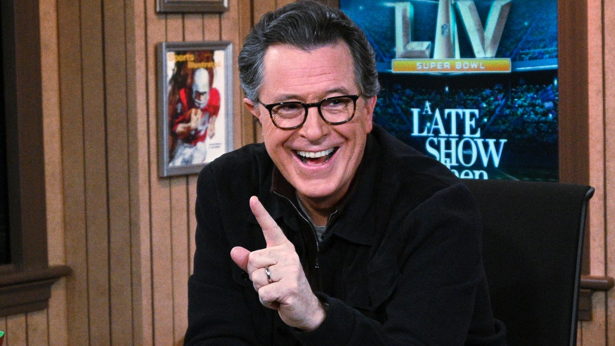 Stephen Colbert laughs on CBS late show