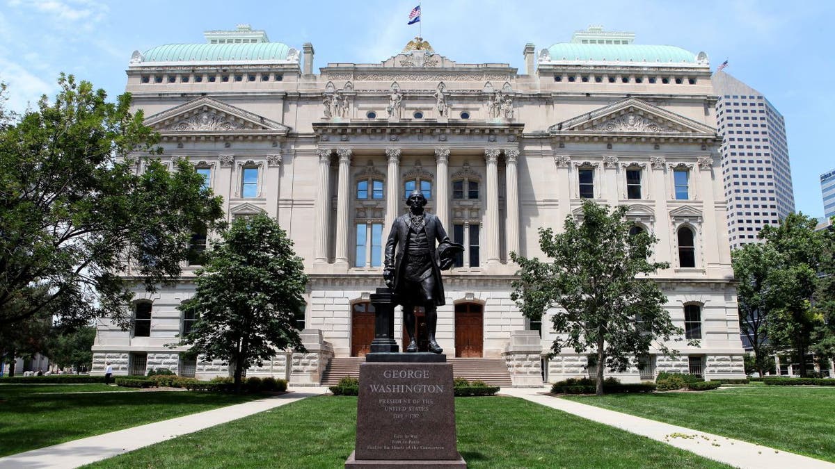 A George Washington statue stands outside the Indiana State Capitol Building on July 16, 2015, in Indianapolis, Indiana.