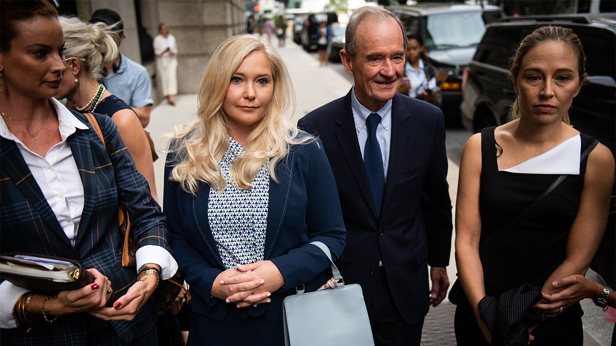 David Boies, representing several of Jeffrey Epstein's alleged victims, center, arrives with Annie Farmer, right, and Virginia Giuffre, alleged victims of Jeffrey Epstein, second left, at federal court in New York on Tuesday, Aug. 27, 2019.