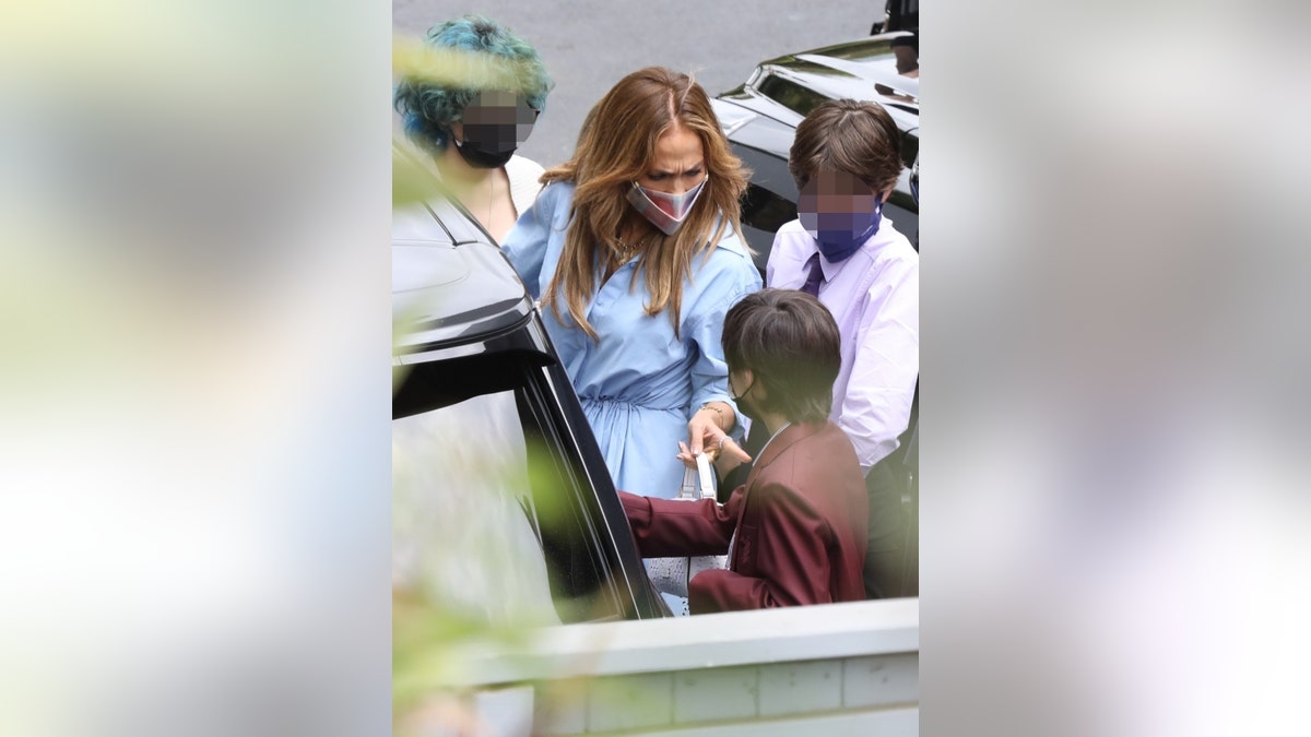 Ben Affleck and Jennifer Lopez spend their afternoon with all their well-dressed kids at The Magic Castle in Los Angeles.