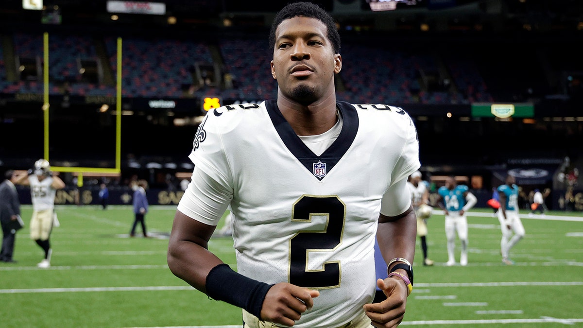 New Orleans Saints quarterback Jameis Winston (2) runs off the field after an NFL preseason football game against the Jacksonville Jaguars in New Orleans, Monday, Aug. 23, 2021. The Saints won 23-21.