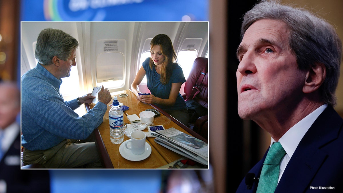 John Kerry plays cards on board his private jet enroute to Albuquerque, New Mexico from Minneapolis on May 4, 2004. (Photo by Paula Bronstein/Getty Images)