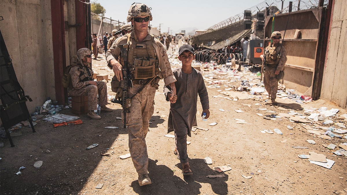 Marine evacuates boy Afghanistan