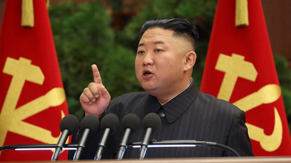 Kim Jong Un speaks during meeting