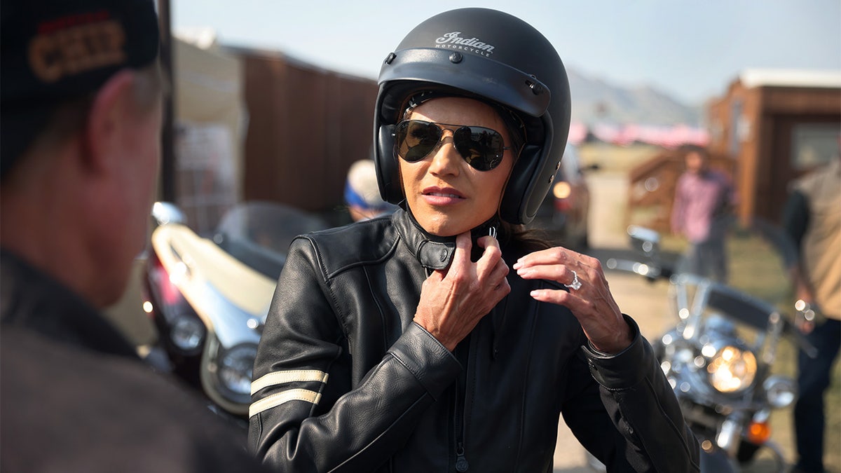 STURGIS, SOUTH DAKOTA - AUGUST 09: Governor Kristi Noem of South Dakota arrives at the Sturgis Buffalo Chip campground after riding in the Legends Ride for charity on a 2021 Indian Chief on August 09, 2021 near Sturgis, South Dakota. Each August hundreds of thousands of motorcycling enthusiast come to the southwest corner of South Dakota for the annual Sturgis Motorcycle Rally. This year the rally is expect to draw more than 500,00 people during its 10-day run. (Photo by Scott Olson/Getty Images)