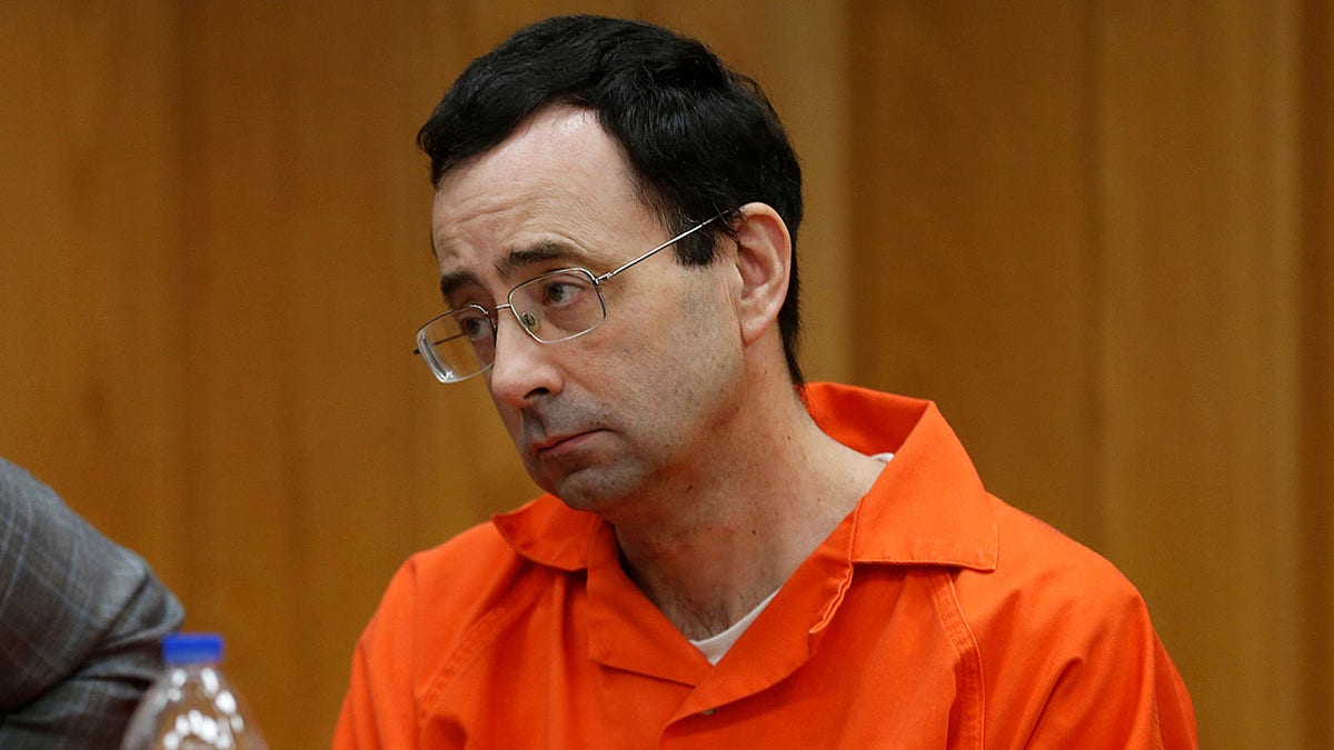 Larry Nassar, a former team USA Gymnastics doctor who pleaded guilty in November 2017 to sexual assault charges, sits in the courtroom during his sentencing hearing in the Eaton County Court in Charlotte