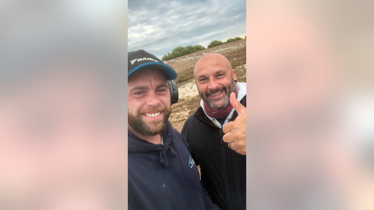 Matt Goldsmith (left) is pictured with Glen Darrell (right)after Goldsmith found Darrell's two missing rings.