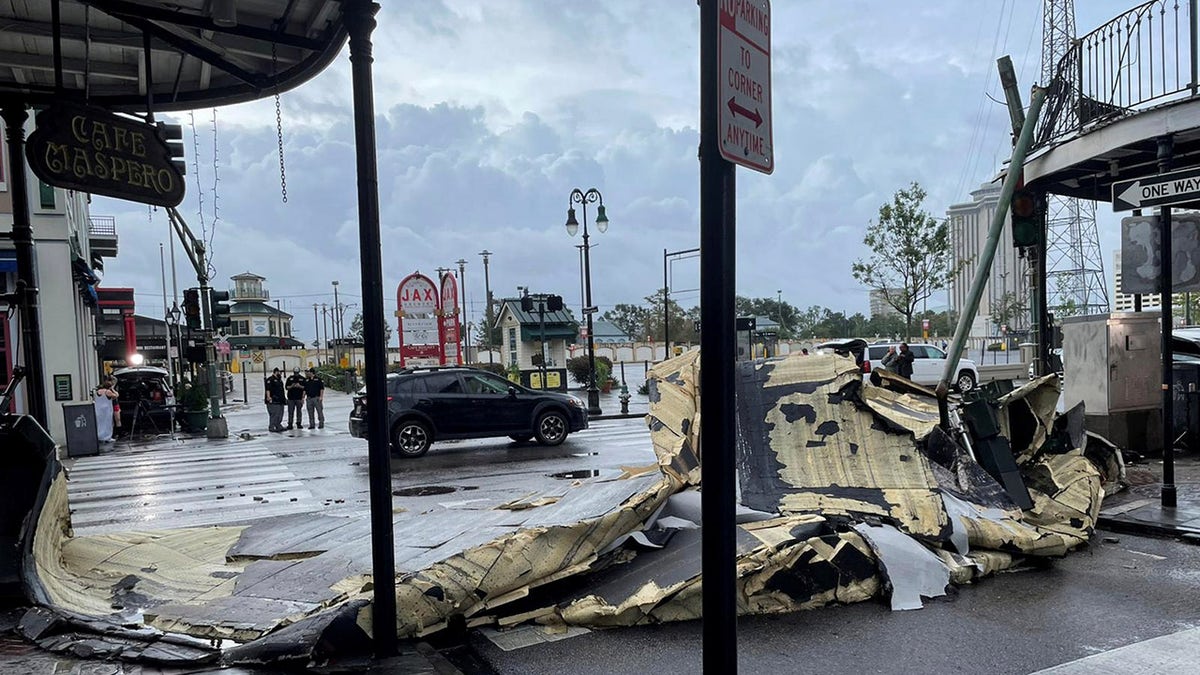 The roof of a building next to Jax Brewery lies on the ground after it was blown off due to strong winds from Hurricane Ida in New Orleans, Louisiana, Aug. 30, 2021. 