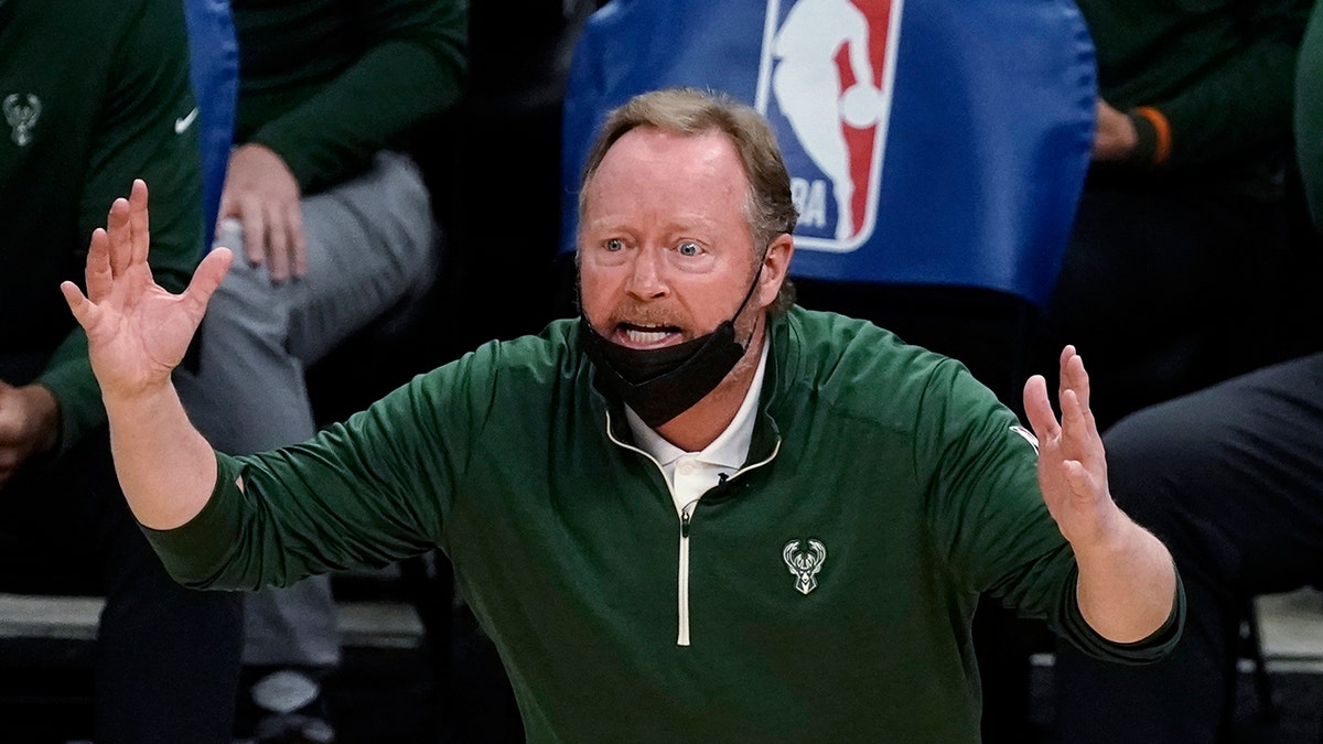 Milwaukee Bucks coach Mike Budenholzer reacts to a call during a February 2021 game against the Toronto Raptors in Milwaukee.