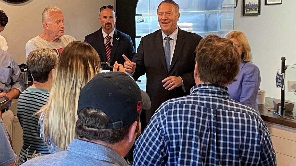 MIke Pompeo helps fellow Repblicans during a stop in NH