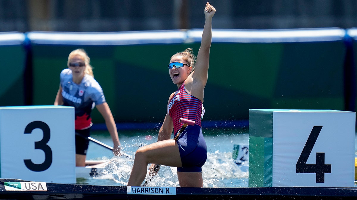 Nevin Harrison, of the United States, reacts after winning the gold medal in the women's canoe single 200m final at the 2020 Summer Olympics