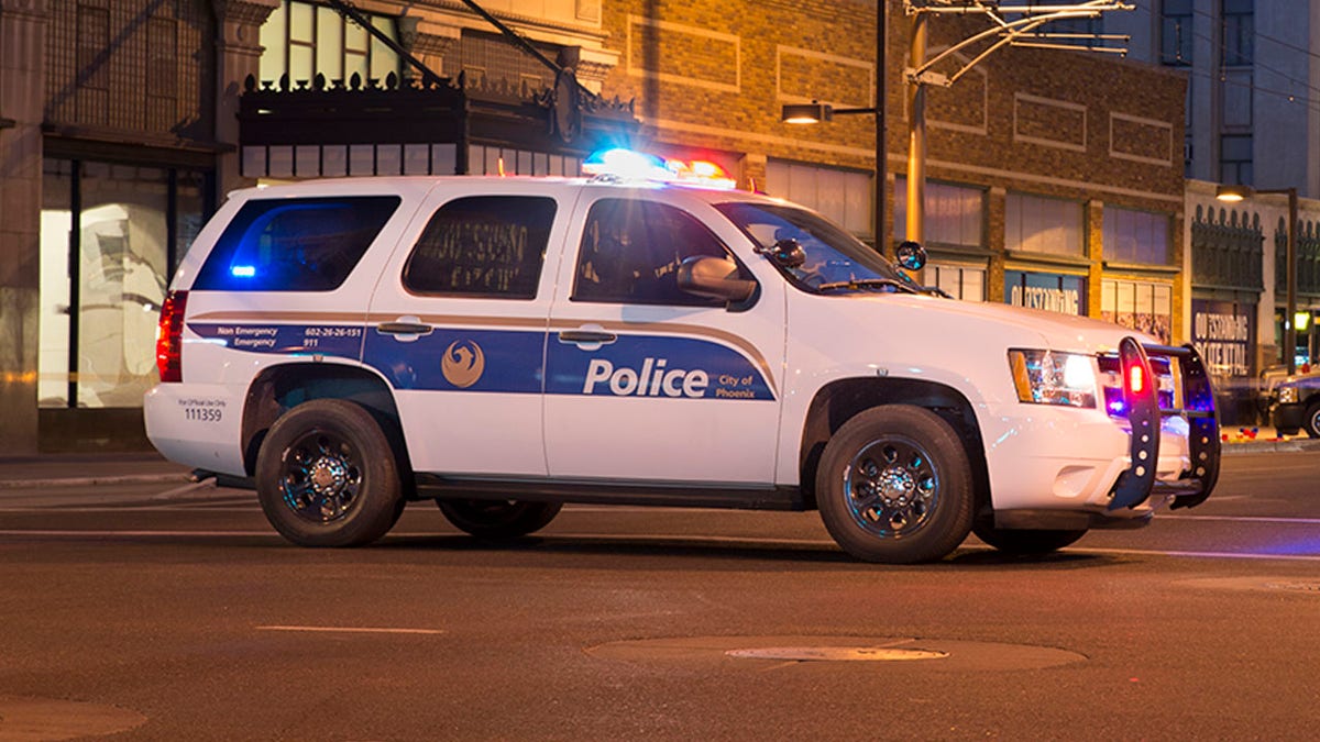 Phoenix police cruiser with its lights on