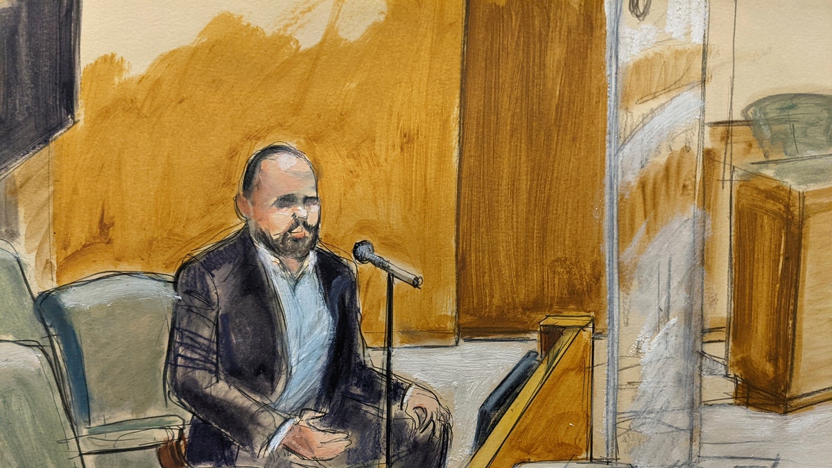 In this courtroom artist's sketch, former R. Kelly employee Tom Arnold testifies at the R&amp;B star's trial in New York, Thursday, Aug. 19, 2021.
