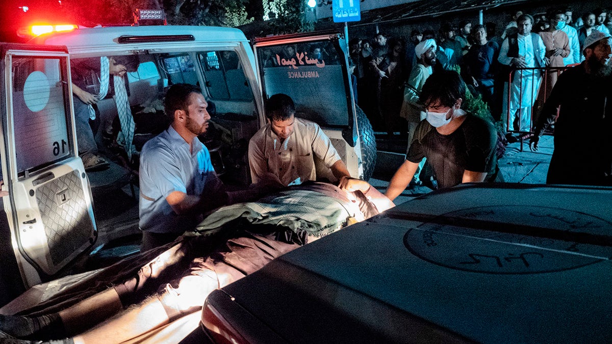 Victims of Thursday's attack at the Kabul airport in Afghanistan arrive at the Emergency Surgical Center for War Victims. (Reuters)