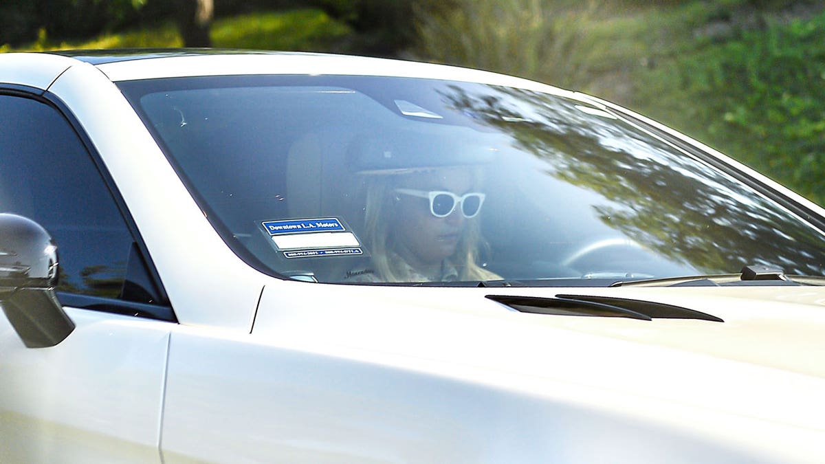 Britney Spears was spotted out for a solo drive near her home in Thousand Oaks, CA After news broke of her Father Jamie Spears agreeing to voluntarily step down from the Conservatorship.