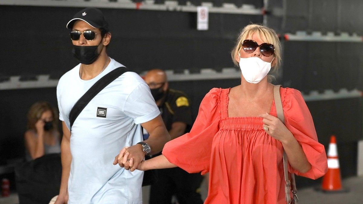 Sandra Lee of 'Semi-Homemade' arrives in Los Angeles with her fiancé Ben Youcef after an international getaway that took place amid the fallout of Andrew Cuomo's resignation from his position as governor of New York.