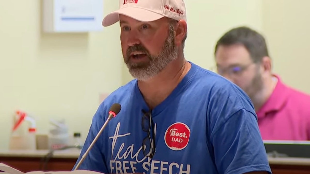 A man speaks at a Loudoun County School Board meeting on Aug. 10.