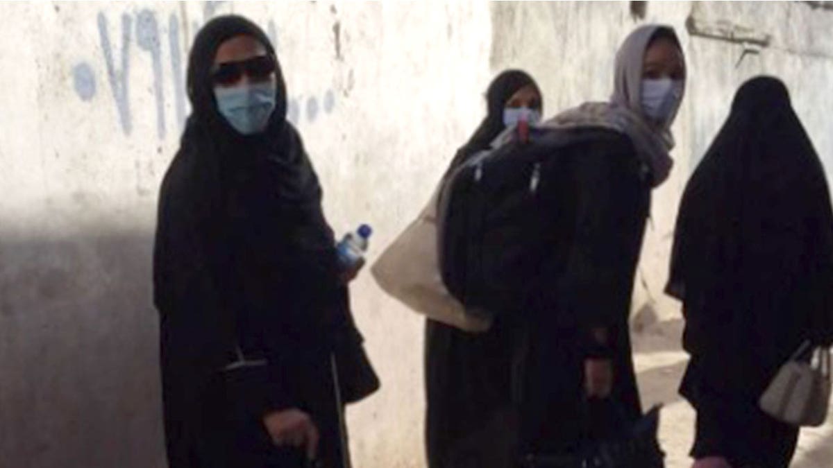 Afghan women are seen at the Kabul airport, Aug. 26, 2021. (We the People)