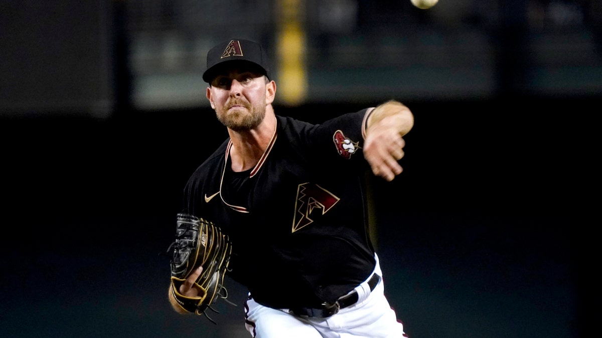 Arizona Diamondbacks starting pitcher Tyler Gilbert throws against the San Diego Padres during the seventh inning of a baseball game, Saturday, Aug. 14, 2021, in Phoenix. (AP Photo/Matt York)