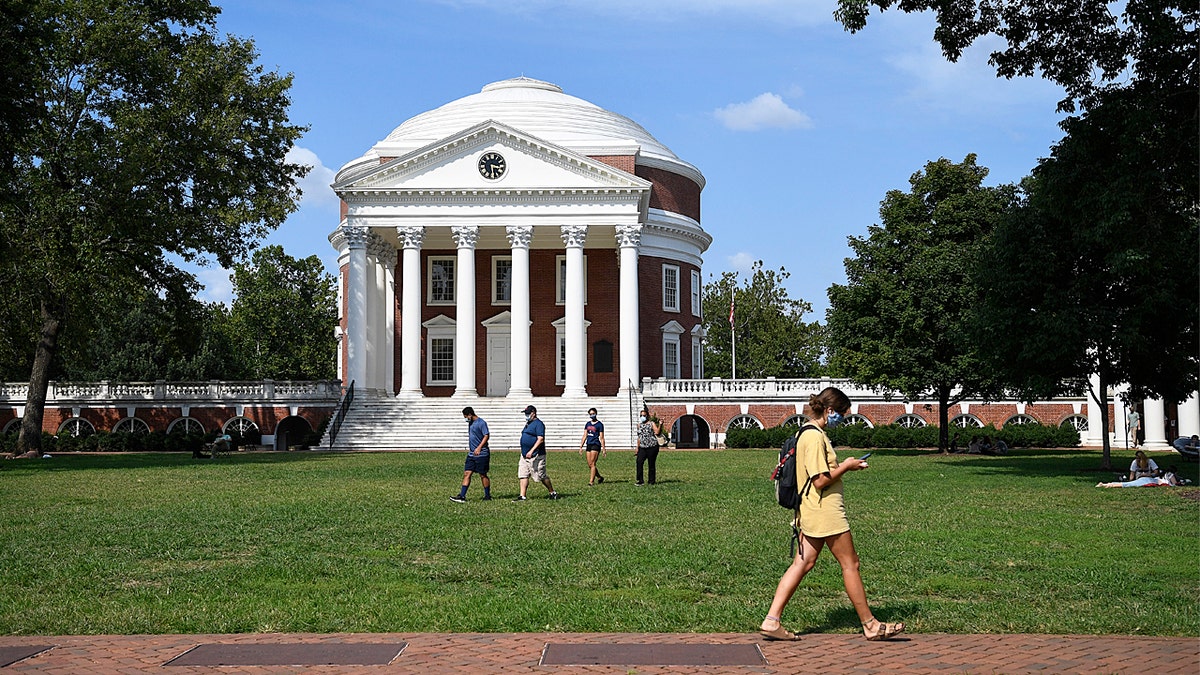 UNITED STATES - SEPTEMBER 8: Students walk across The Lawn as in-person classes are underway at the University of Virginia on Tuesday, Sept. 8, 2020.