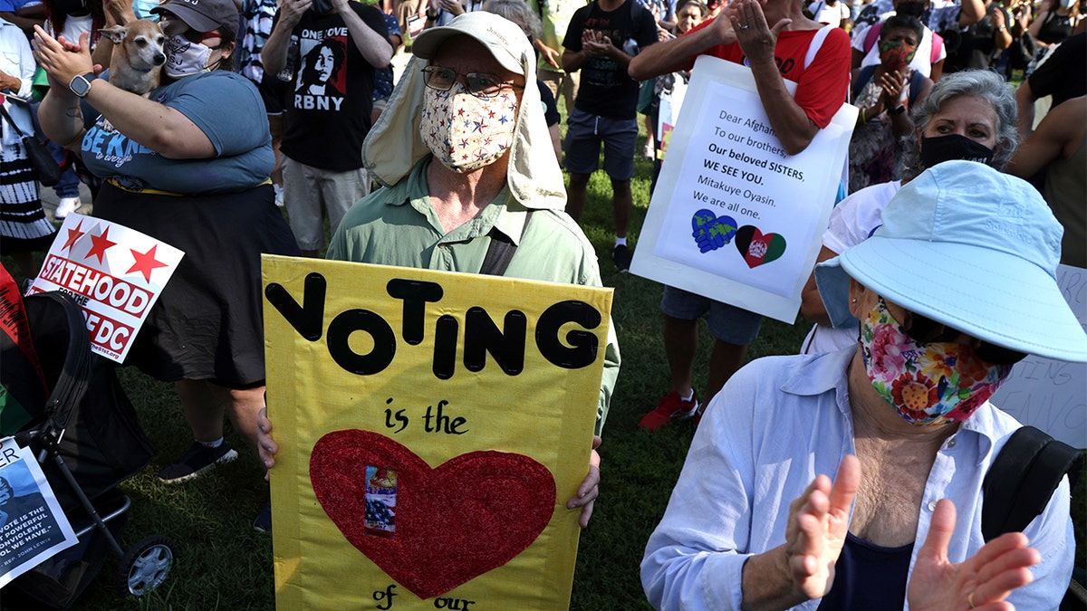 Voting rights activists participate in a pre-march rally during a March On For Voting Rights event at McPherson Square Aug. 28, 2021 in Washington, DC. (Getty Images)