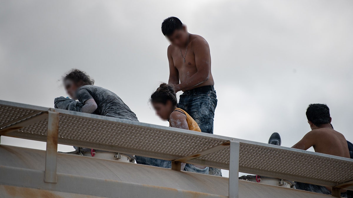 Border Patrol agents in Texas rescued dozens of illegal immigrants hiding in railcars in two separate smuggling attempts this week, finding some migrants covered in a 