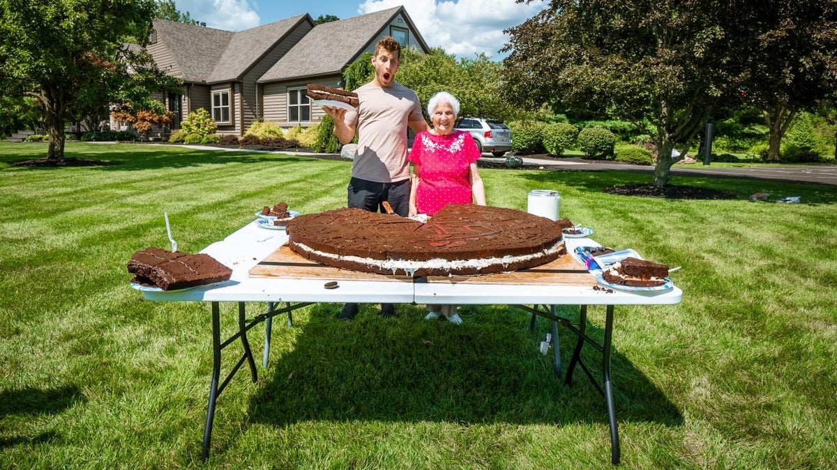 Ross Smith and his 95-year-old grandmother are proud of their 180-pound Oreo and are confident that they broke a Guinness World Record for the largest cream-filled biscuit.