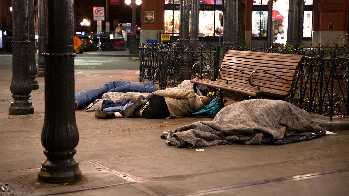 Seattle sidewalk homeless sleeping at night