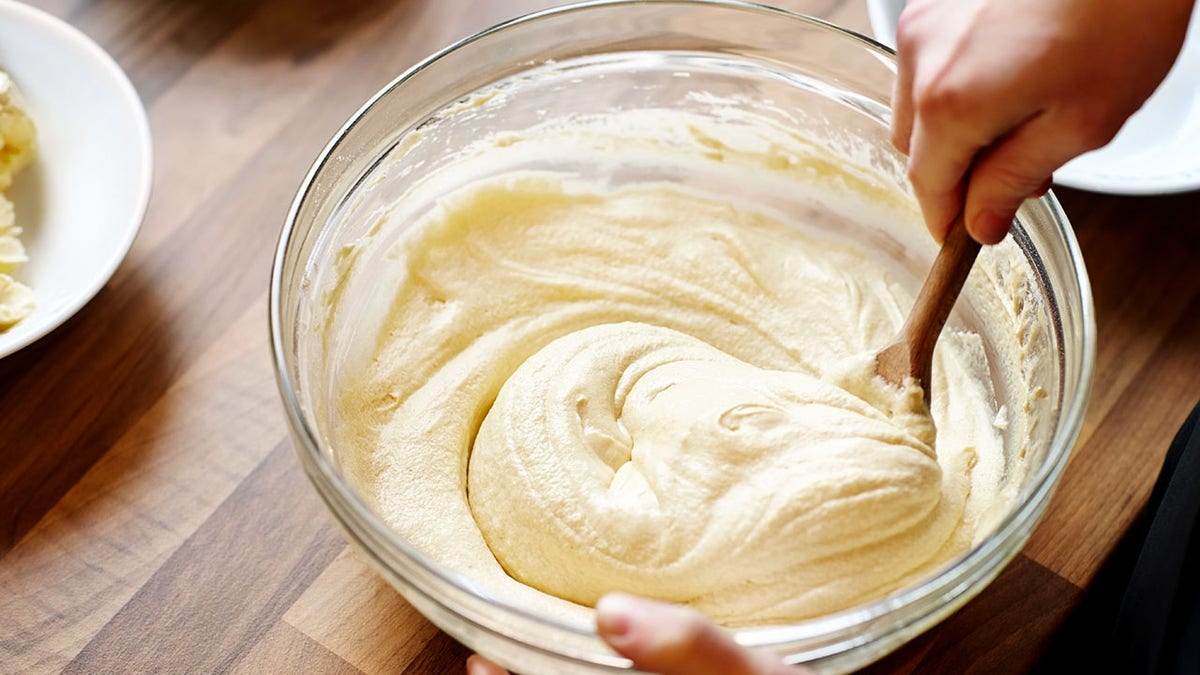 Chef making muffins batter