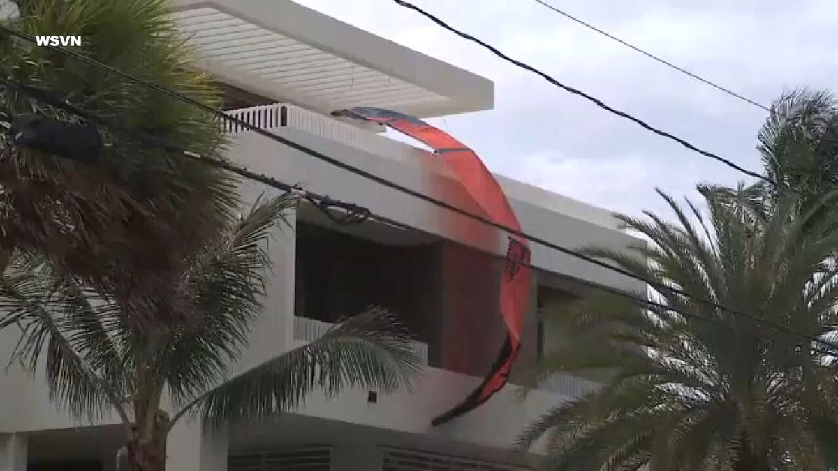 A Florida kite surfer's kite is visible at the scene of Wednesday's tragedy. (WSVN-TV Miami)