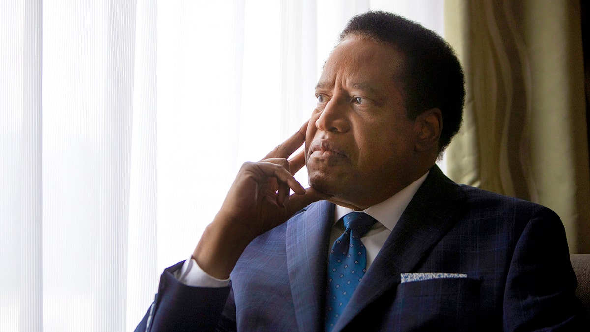 Larry Elder sits in his hotel room in San Francisco