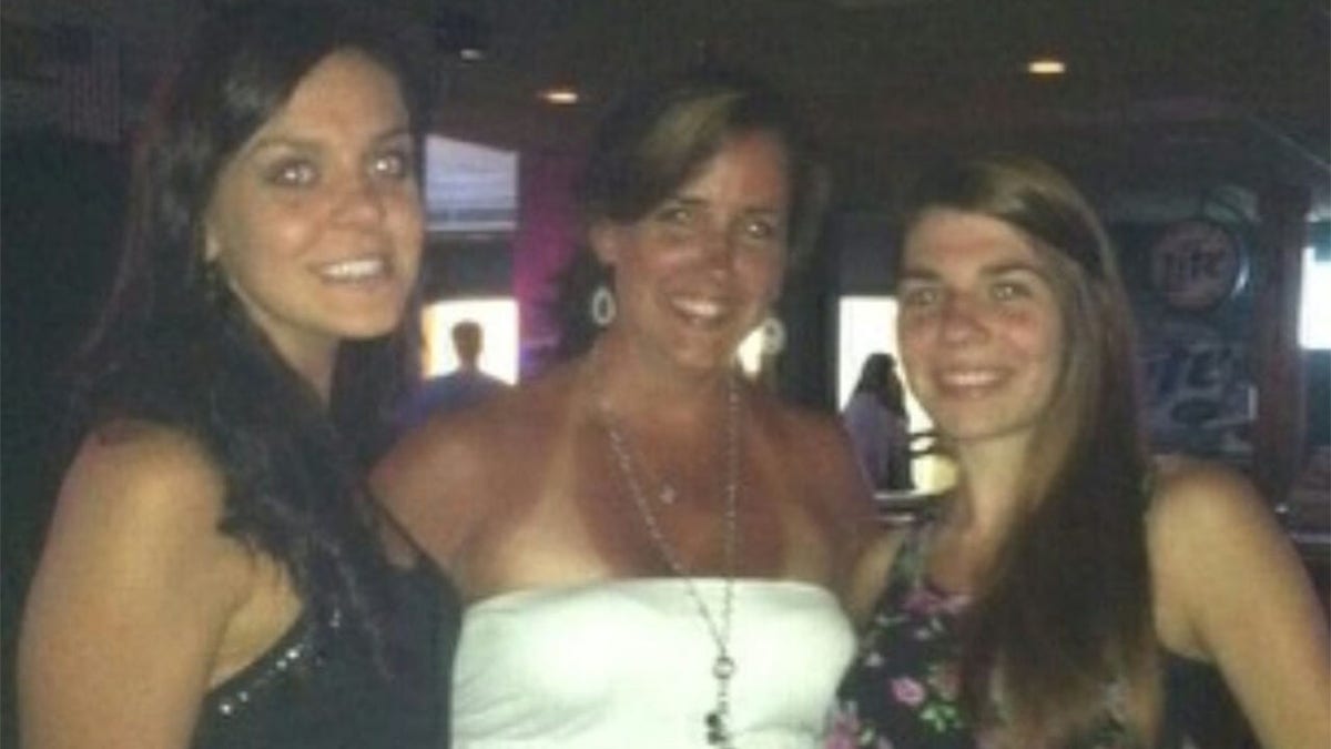 Susan Marie Smuzinsky (center) and her daughters Samantha Smuzinsky(left) and Danielle Smuzinsky (right).
