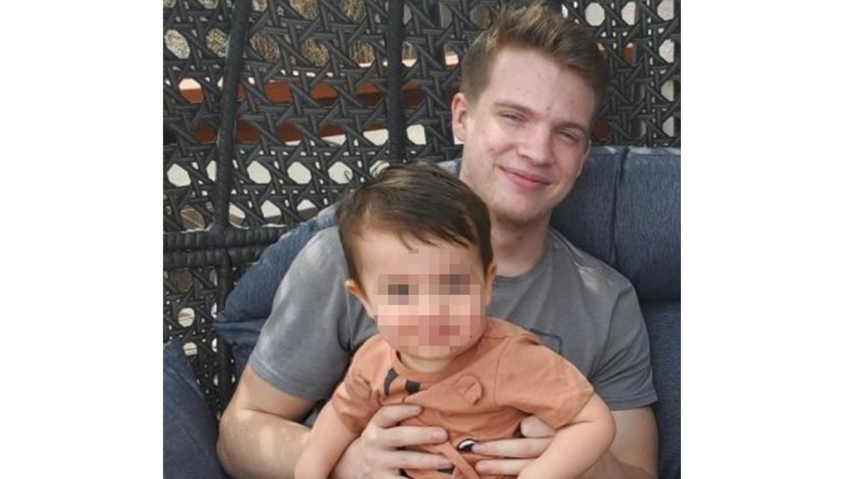 Dustin Wakefield, 21, and son. (Credit: Angela Wakefield)