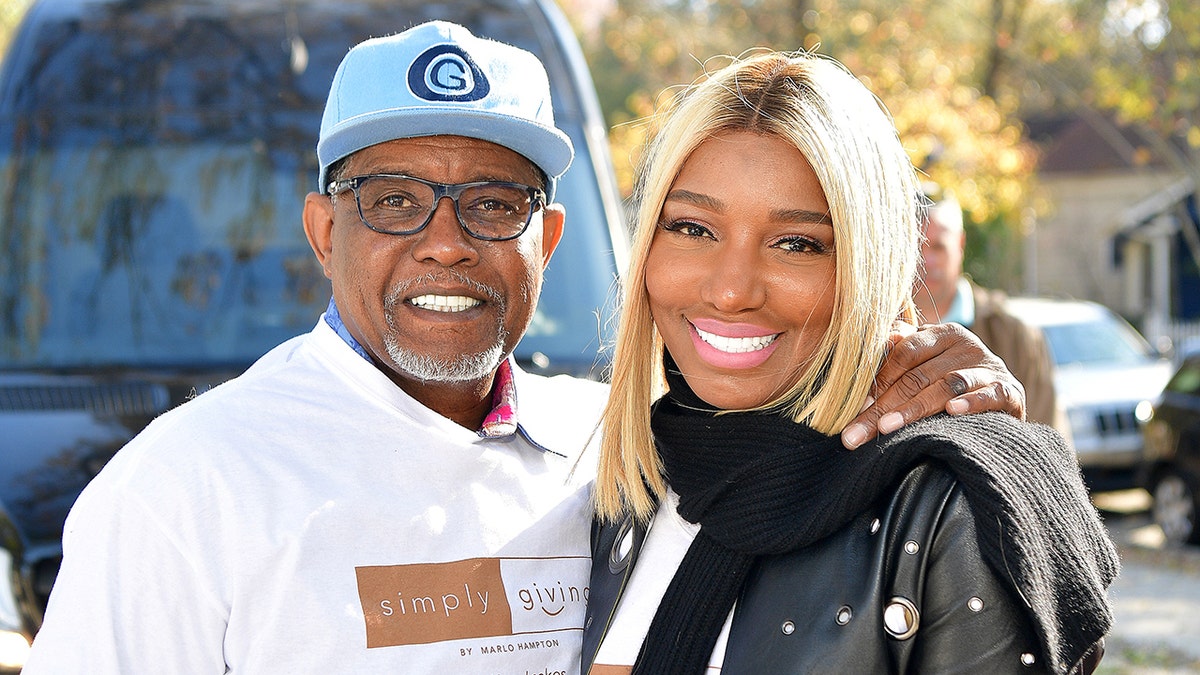 Gregg Leakes and Nene Leakes smiling