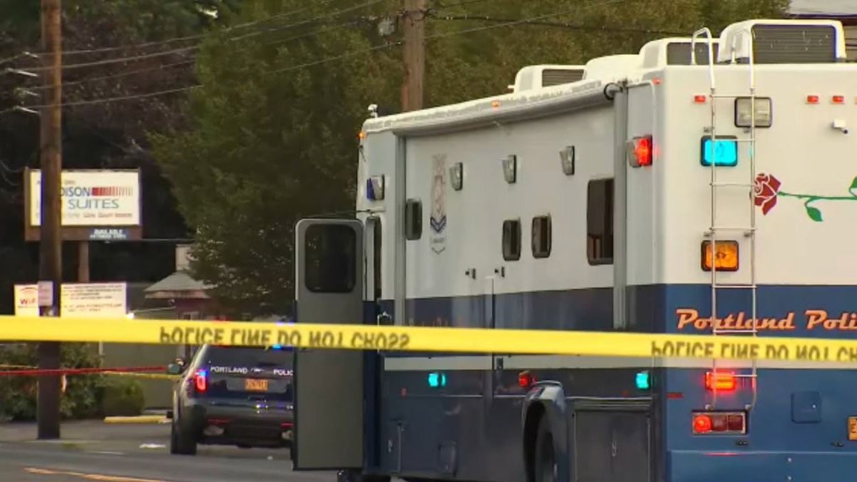 Portland police set up a command van outside the scene of a fatal shooting that happened near a homeless camp early Tuesday. 