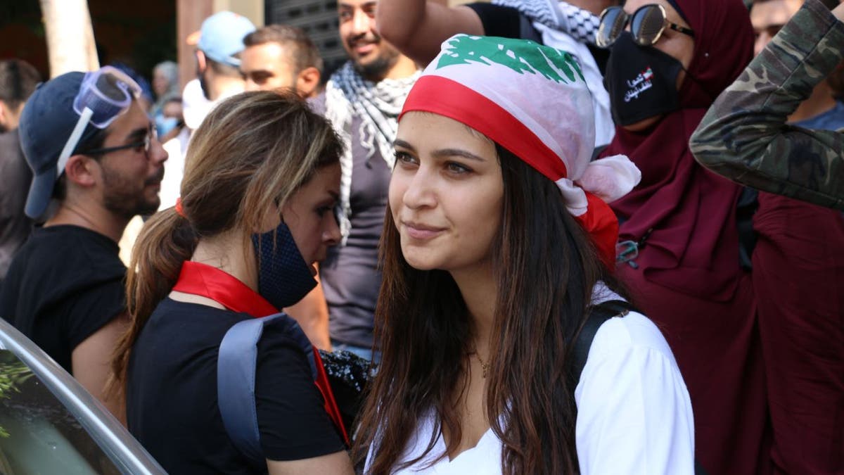 Thousands gathered at the site of the blast to pay their respects before marching through the city, calling for the parliament to be dissolved and laws to be suspended that protect top government officials.