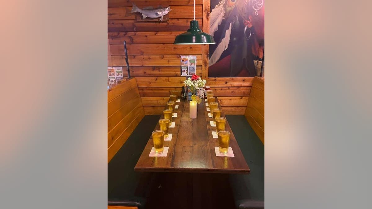 Tyler Scott Parker, the manager of the St. Matthews Texas Roadhouse in Louisville, Ky., poured out 13 pints and set aside a table for the American service members who were killed in a terrorist bombing outside Afghanistan's Hamid Karzai International Airport.