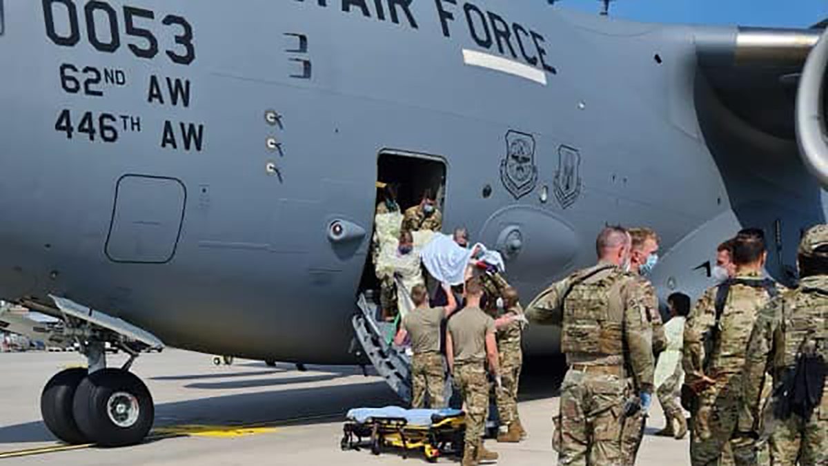 U.S. airmen helped a pregnant Afghan mother deliver her baby in the cargo bay of a U.S. Air Force C-17 during an evacuation flight from the Middle East on Saturday, U.S. officials said. 