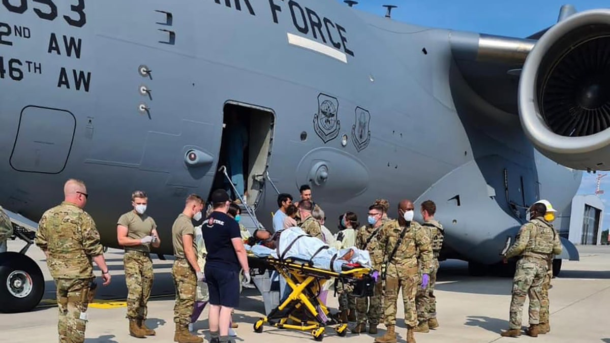 U.S. airmen helped a pregnant Afghan mother deliver her baby in the cargo bay of a U.S. Air Force C-17 during an evacuation flight from the Middle East on Saturday, U.S. officials said.