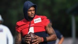 FILE- In an Aug. 2, 2021 file photo, Texans quarterback Deshaun Watson practices with the team during NFL football practice in Houston.
