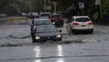 Car drive through high water