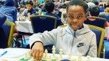 A 10-year-old who once lived in a New York City homeless shelter has achieved a remarkable title for someone his age: chess master.

Tanitoluwa "Tani" Adewumi became America's newest chess master on May 1 at the age of 10 years, seven months and 28 days, making him the 28th youngest person to achieve the status, according to the U.S. Chess Federation.