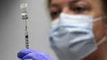 FILE - In this March 2, 2021, file photo, pharmacy technician Hollie Maloney loads a syringe with Pfizer's COVID-19 vaccine at the Portland Expo in Portland, Maine. The U.S. gave full approval to Pfizer's COVID-19 vaccine on Monday, Aug. 23, 2021.
