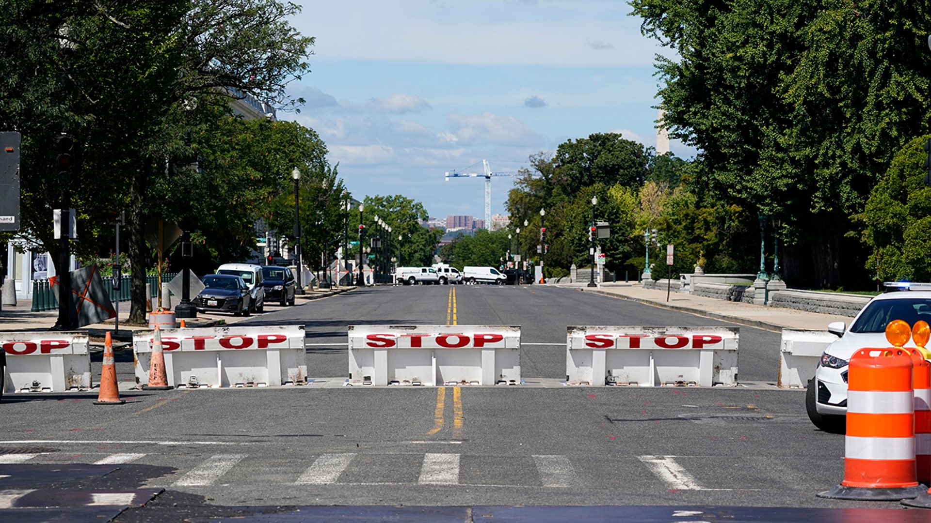 Law enforcement officials surround an area near the U.S. Capitol and a Library of Congress building in Washington on Thursday, Aug. 19, 2021, as they investigate a report of a pickup truck containing an explosive device. (AP Photo/Alex Brandon)