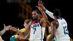 US men's basketball team advances to gold medal game after beating Australia