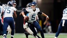 Woodside, Barkley throw TDs as Titans stop Falcons 23-3