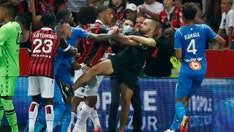 Nice-Marseille Ligue 1 match under review following chaos between players, fans